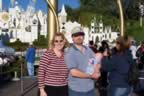 Jennifer, Greg and Greyson waiting in line for Smallworld. Greysons first ride and he sleeps through it (201kb)